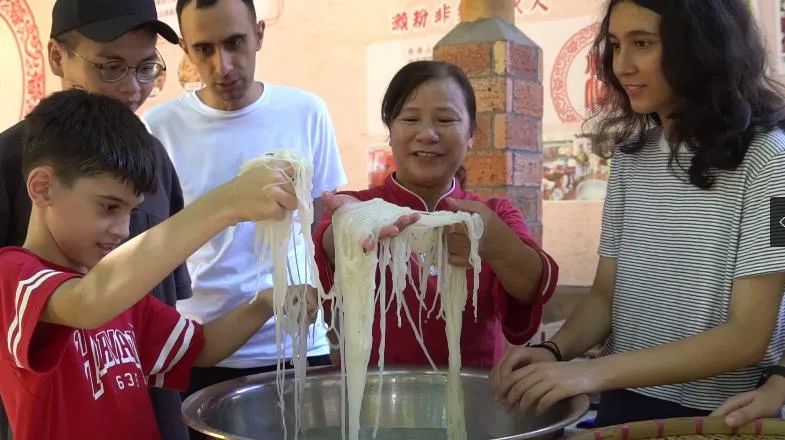 Young teens from Azerbaijan explore Gaoming rice noodles