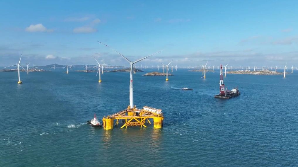 World&#39;s first floating wind power-fishery integrated platform built in east China